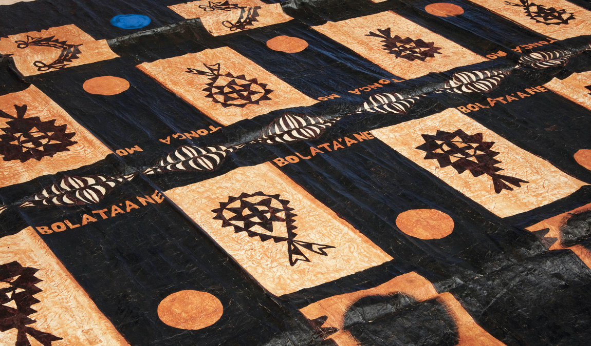 Kulimoe'anga Stone Maka Toga mo Bolata'ane (Tonga and Britain) (detail) 2008–10. Oil, clay, dye on tapa cloth. Installation view, 22nd Biennale of Sydney (2020): NIRIN, Museum of Contemporary Art Australia, Sydney. Courtesy the artist and Museum of Contemporary Art Australia. Photo: Zan Wimberley