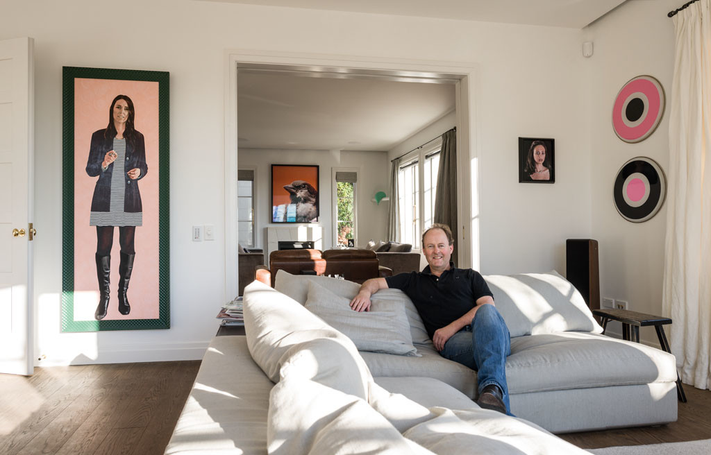 Garth Gallaway with part of his collection. Left to right: Liz Maw Jacinda 2014; Michael Parekowhai Ed Brown 2004; Todd Robinson green balloon from Oooh series 2013; Yvonne Todd Self-Portrait as Christina Onassis 2008; A pair of Julian Dashper Untitled drumskins, 1996. Photo: John Collie